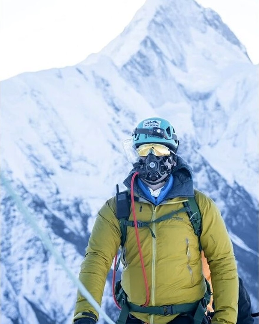 Dorje, mountain guide, crossing a high glacier pass on ropes