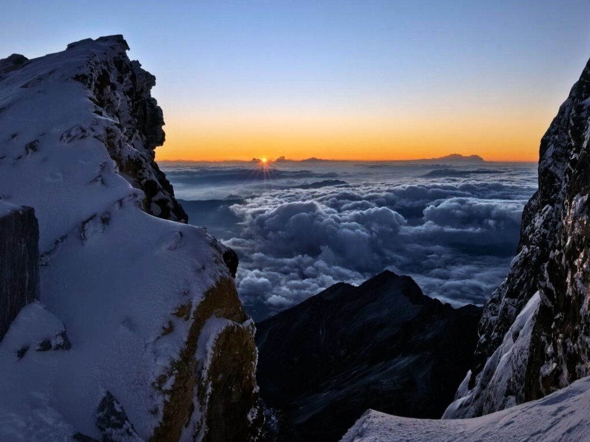 Sunrise over a sea of cloud from the ridge above Haba base camp